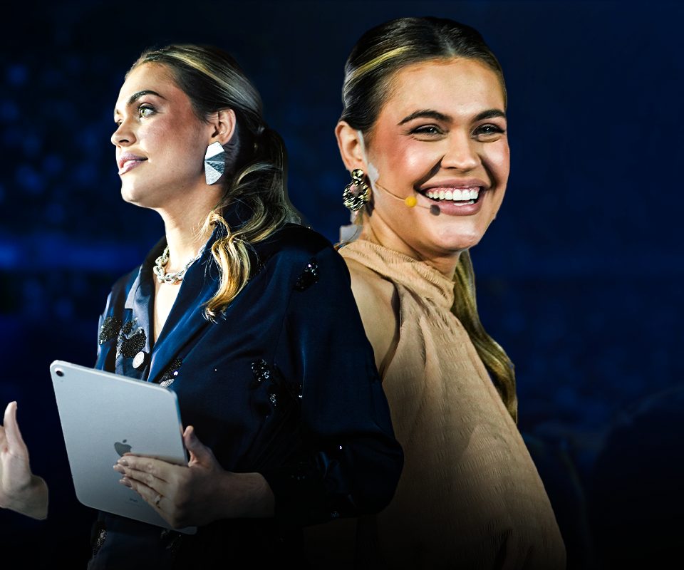 Nathalia Caron falando no palco da Imersão PIVA